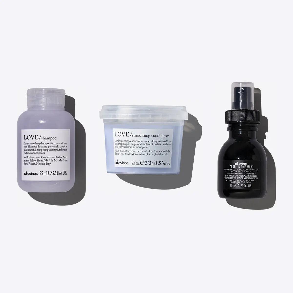 Davines Love Smoothing + Oi Travel Set featuring shampoo, conditioner, and all-in-one milk for nourished hair.