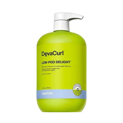 DevaCurl Low-Poo Delight 12 oz bottle, a lightweight cleanser for dry, fine curls, promoting moisture and bounce.