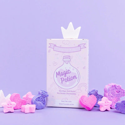 Magic Potion mini bath bombs packaging with colorful fizzy shapes on a lilac background, perfect for a relaxing bath experience.