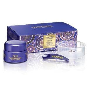 75-15 Gel-like Mask by Vagheggi with jar, spatula, and mixing bowl, surrounded by vibrant blue packaging.