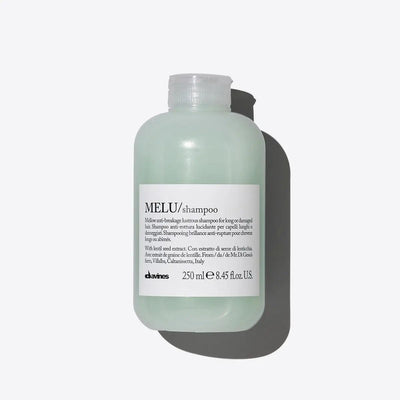 Davines MELU Shampoo 250ml bottle for long damaged hair, luxurious restorative haircare product on white background.