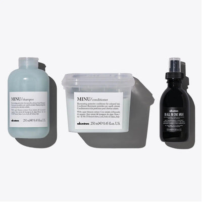 Davines MINU + OI Set featuring shampoo, conditioner, and all-in-one milk for vibrant color and shine.
