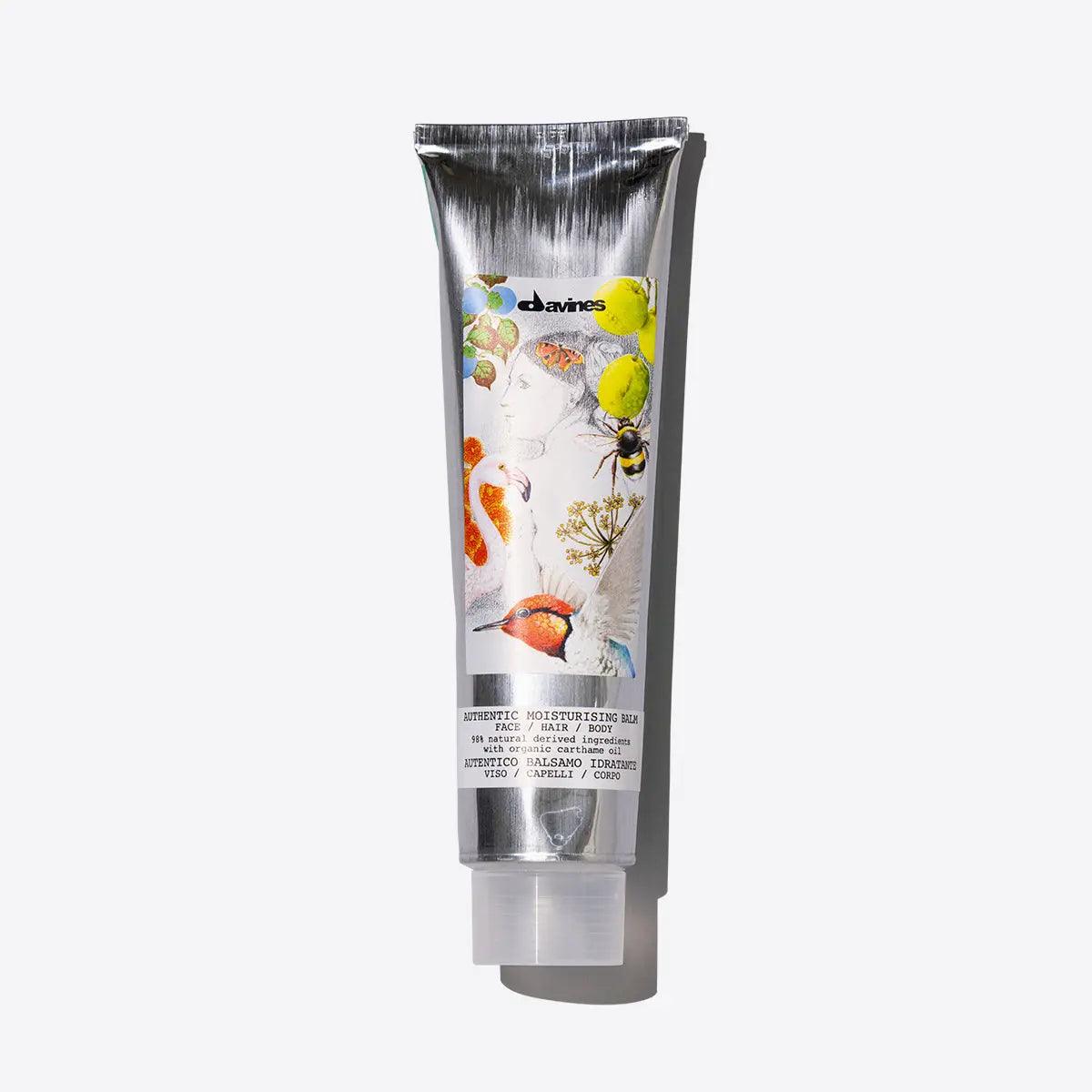 Multi-function moisturizing balm tube with vibrant design for soft skin and hair, gentle makeup removal, and nourishing care.