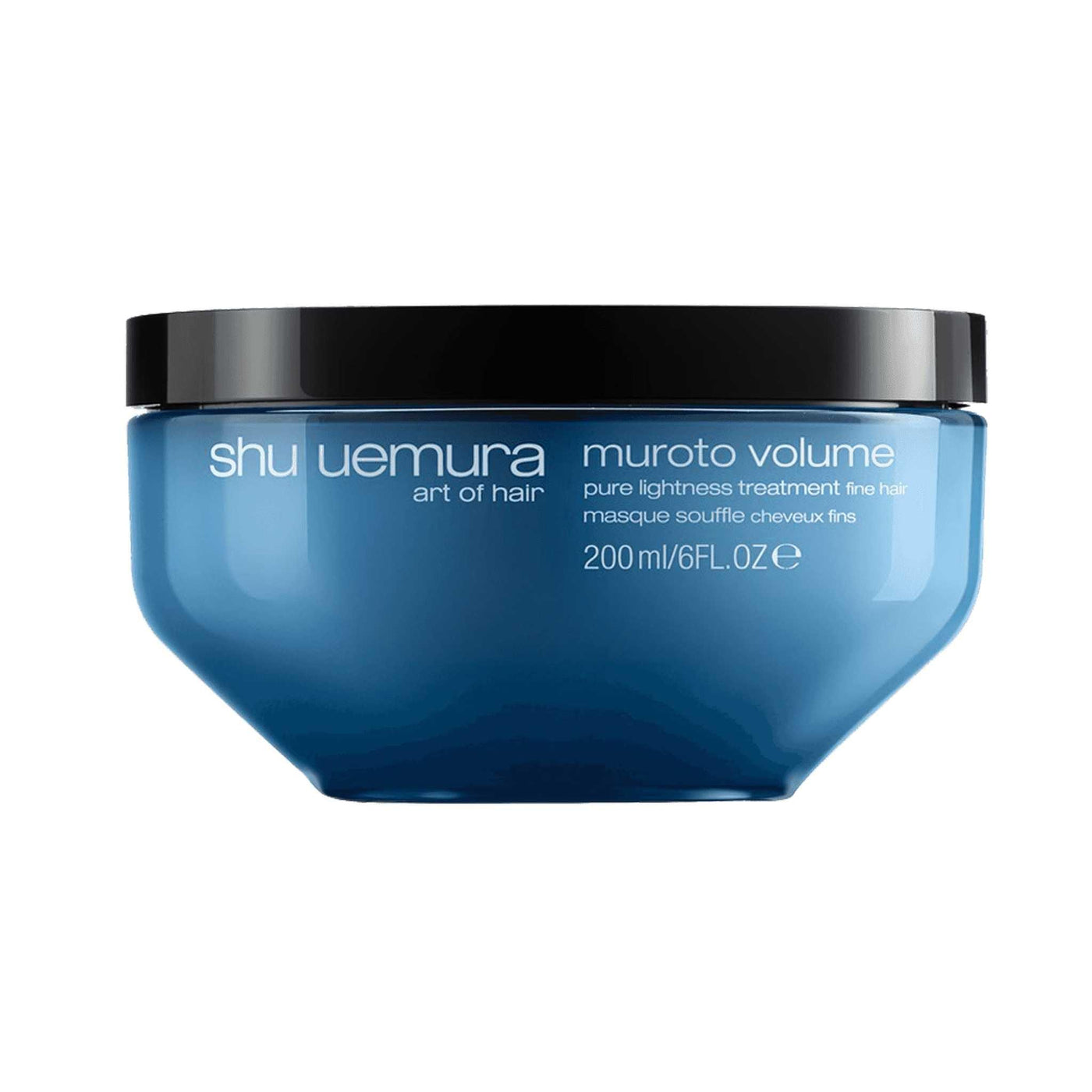 Muroto Volume Lightweight Care Treatment by Shu Uemura in a blue jar, designed for adding volume to fine hair.