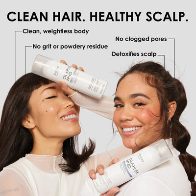 Two women displaying Olaplex No.4D Clean Volume Detox Dry Shampoo, highlighting clean hair and healthy scalp benefits.