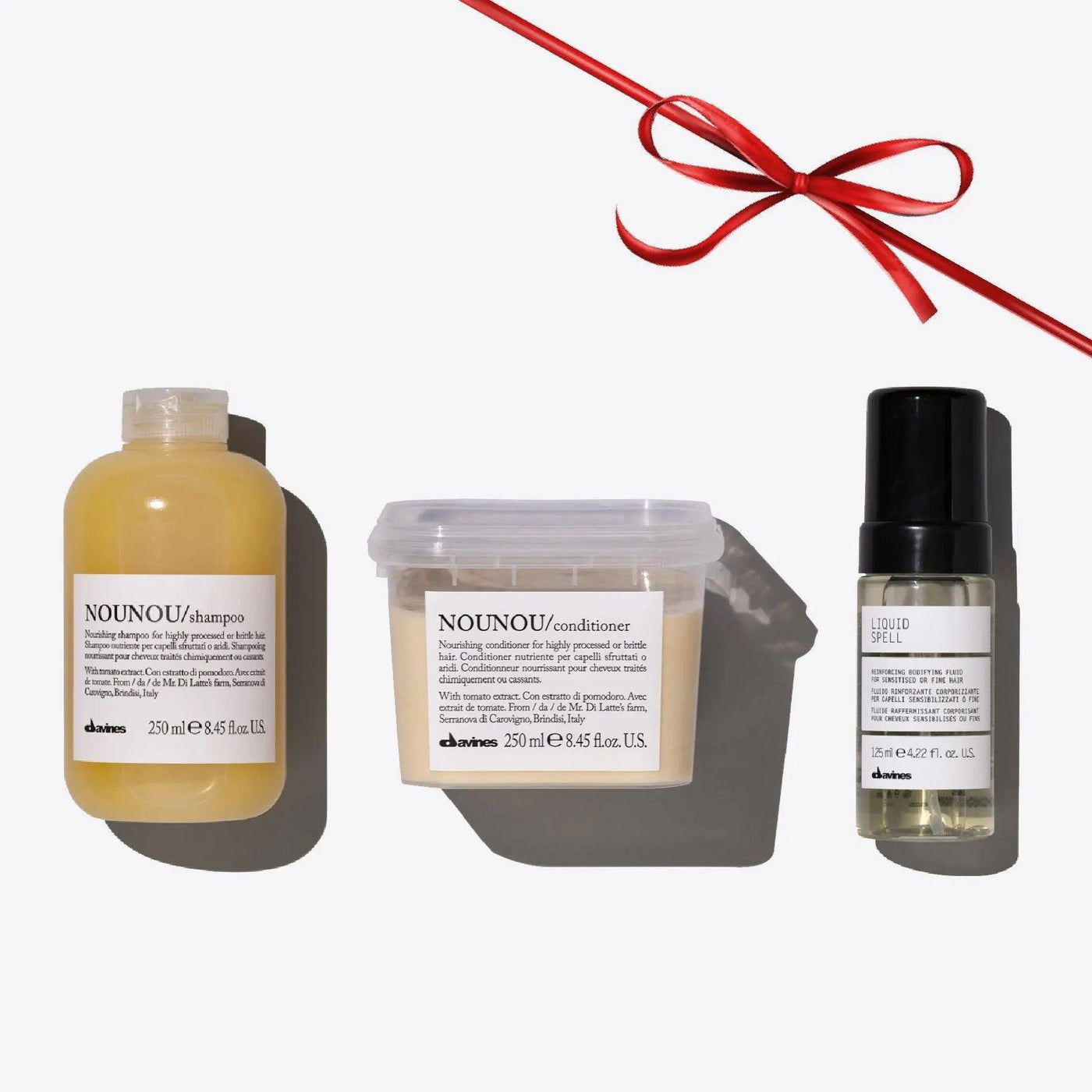Nounou + Liquid Spell Set featuring nourishing shampoo, conditioner, and liquid spell for repairing distressed hair.