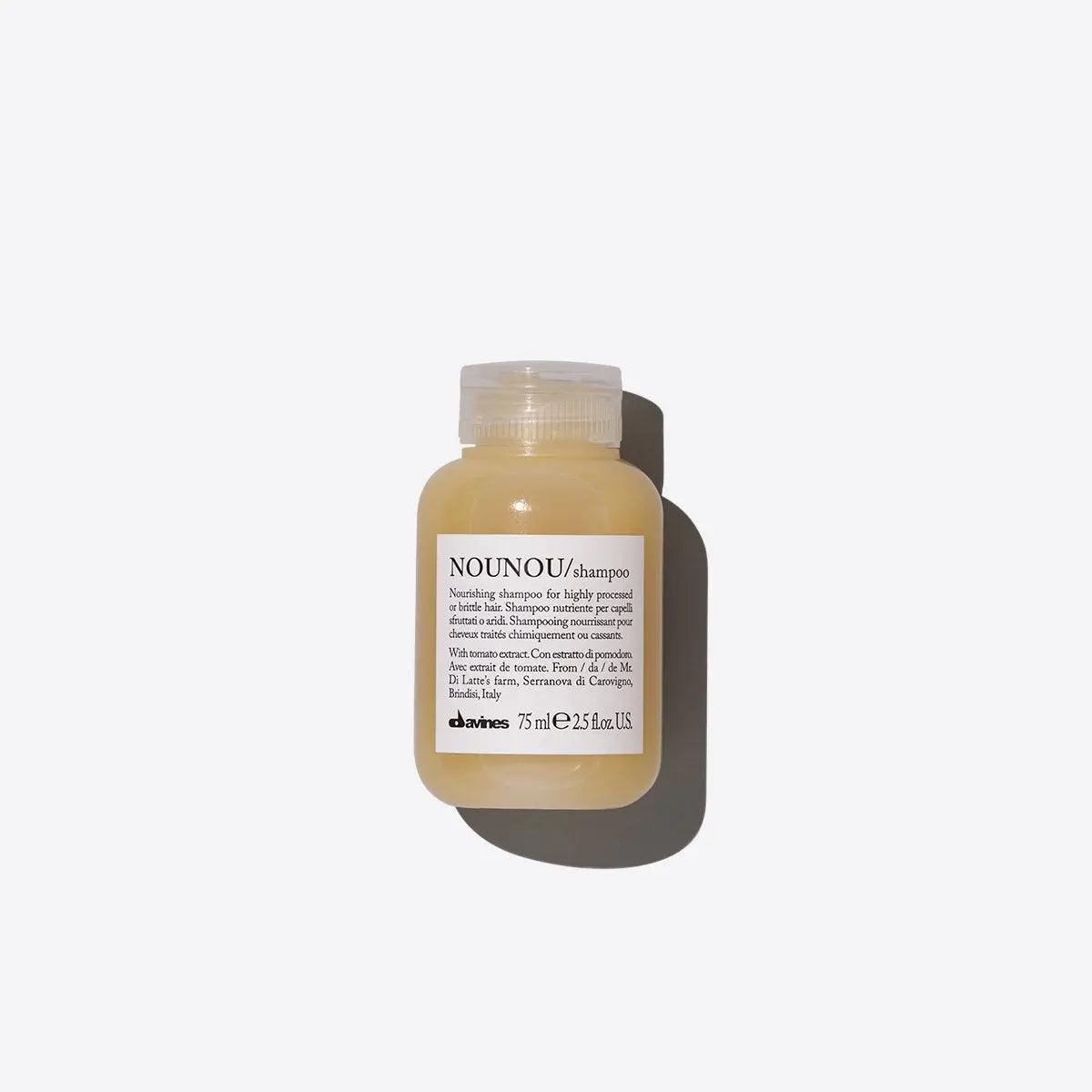 NOUNOU shampoo bottle for highly processed hair on a white background.