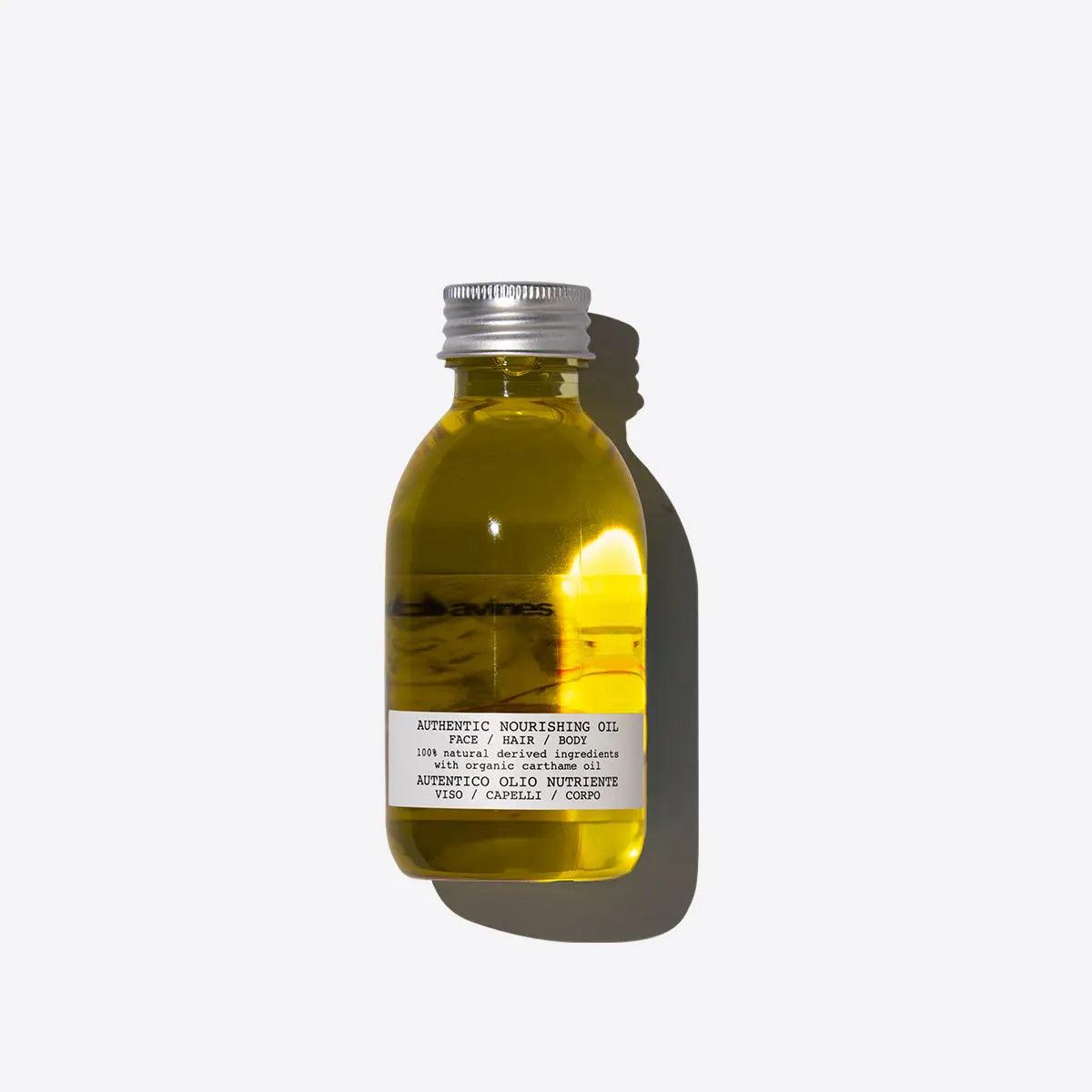 Nourishing oil bottle, moisturizing for hair and skin, enhancing softness and shine, suitable for all hair types.