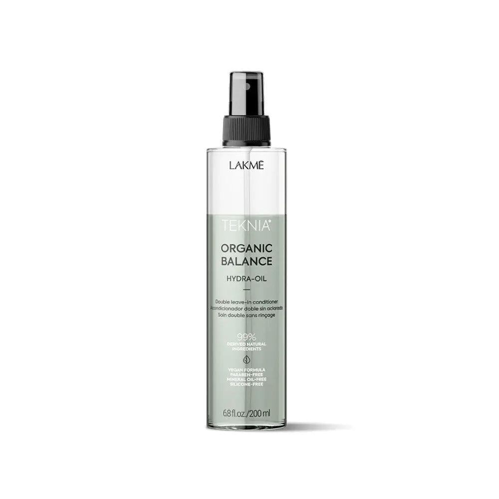 Lakme Organic Balance Hydra-oil spray bottle, designed for nourishing and protecting hair with a refreshing citrus fragrance.