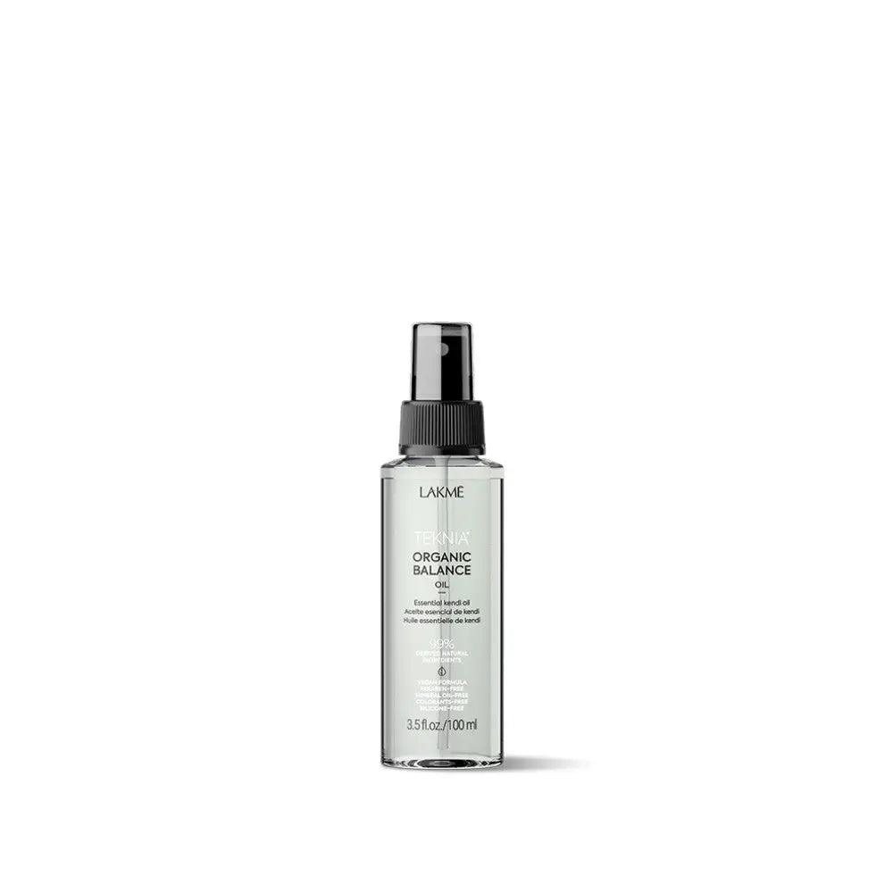 Organic Balance Oil in a sleek bottle, nourishing hair and scalp with a refreshing citrus fragrance. Non-greasy and fast-absorbing.