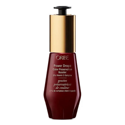 Oribe Power Drops Color Preservation Booster with Vitamin C for hair color protection.