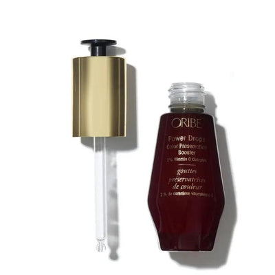 Oribe Power Drops Color Preservation Booster with gold dropper, hair care product for color protection.