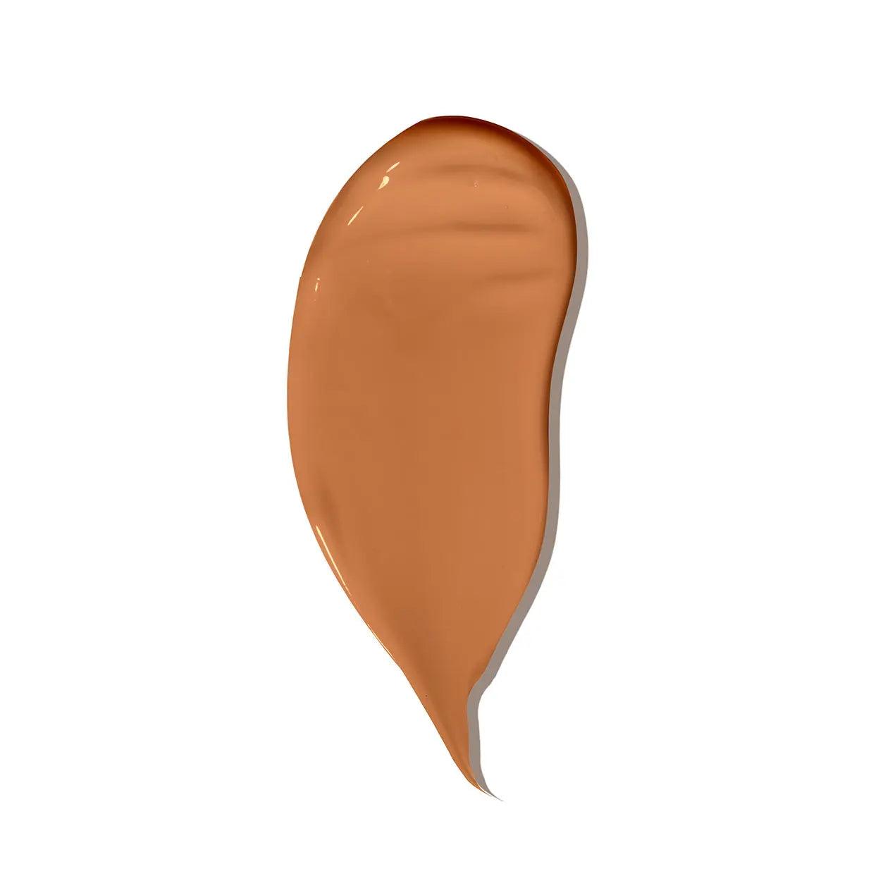 Swatch of Rōsilliance® Tinted Moisturizer Organic Sunscreen SPF 30 in Bronze Goddess shade, showcasing a creamy bronze texture.