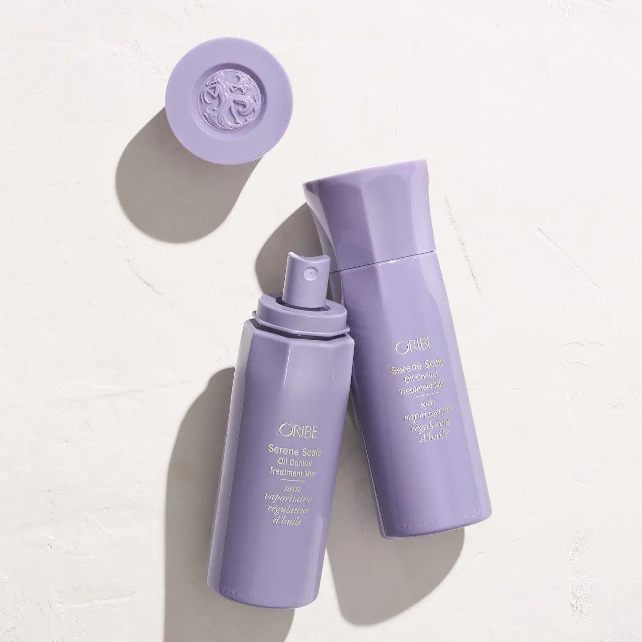 Oribe Serene Scalp Oil Control Treatment Mist bottles on a light background, designed to refresh oily scalps for all hair types.