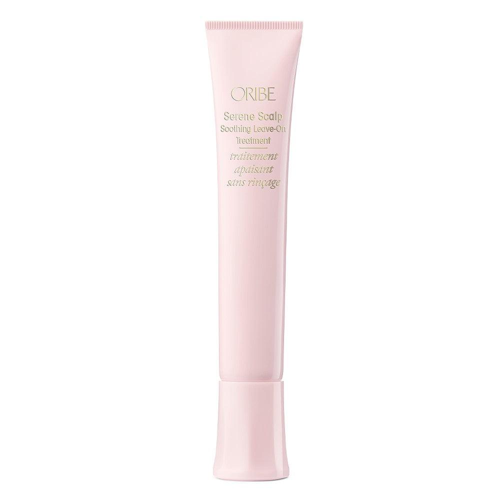 Oribe Serene Scalp Soothing Leave-On Treatment in a pink tube for scalp care and irritation relief.