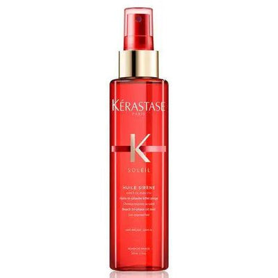 Kérastase Soleil Huile Sirene Hair Oil Mist in a spray bottle, providing sun protection and shine for all hair types.