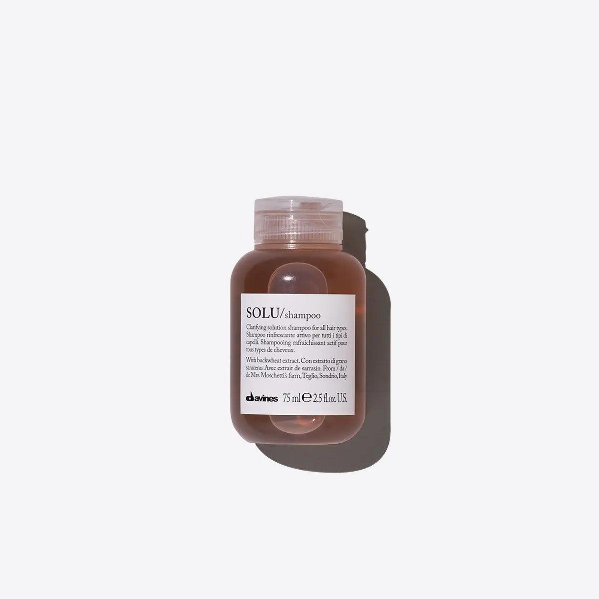Davines SOLU shampoo bottle for clarifying and volumizing hair, 75ml, sulfate-free and color-safe hair care product.
