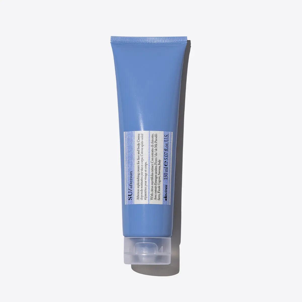 Blue skincare tube with white label, professional skincare product for daily use, moisturizer in sleek packaging.