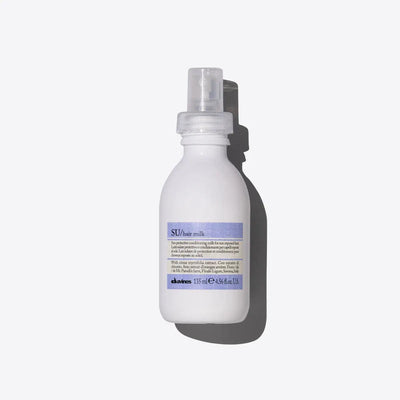 SU Milk leave-on spray cream for hair with UV protection, keeping hair soft and light during sun exposure.