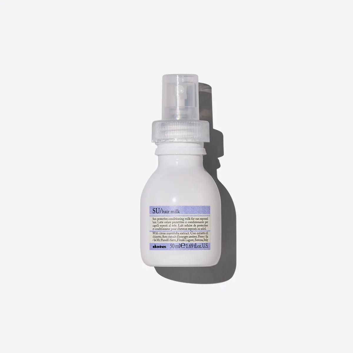 Su Milk leave-on spray cream for hair, enriched with UV protection and hydration for sun exposure.