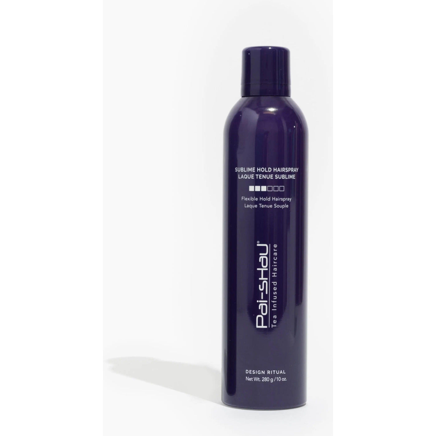 Sublime Hold Hairspray by Pai-Shau in a sleek spray can, offering flexible hold and humidity protection for styled hair.