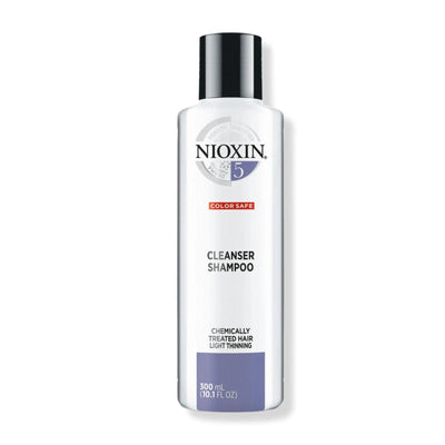 Nioxin System 5 Cleanser Shampoo for chemically treated hair, detoxifying shampoo for light thinning, 300ml bottle.