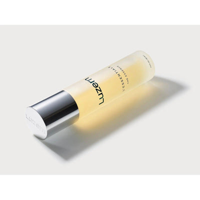 The Essence serum bottle, a weightless alcohol-free formula designed to nourish and hydrate skin with Swiss extracts.
