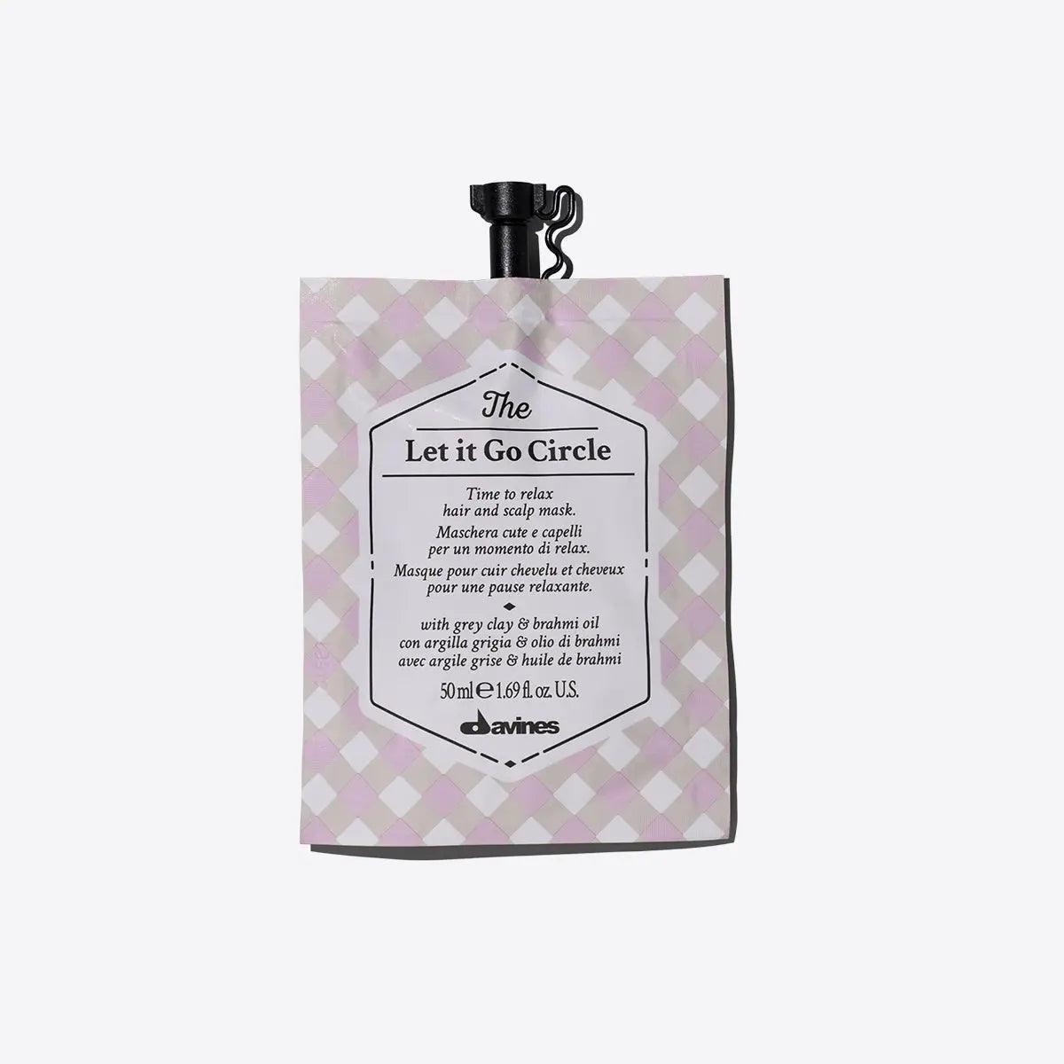 The Let It Go Circle moisturizing hair and scalp mask by Davines, designed for hydration and relaxation in a 50ml pouch.