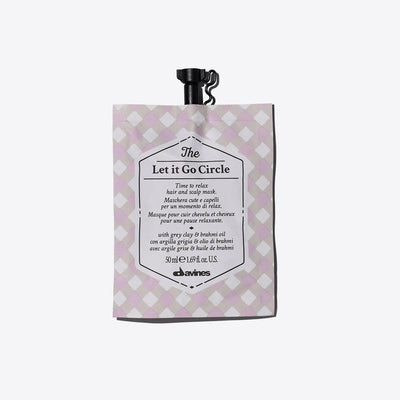 The Let It Go Circle moisturizing hair and scalp mask by Davines, designed for hydration and relaxation in a 50ml pouch.