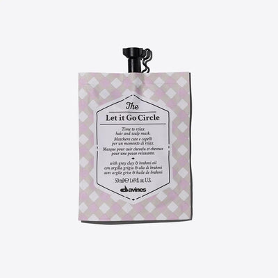 The Let It Go Circle hair and scalp mask pouch with relaxing benefits for hydration and softness, by Davines.