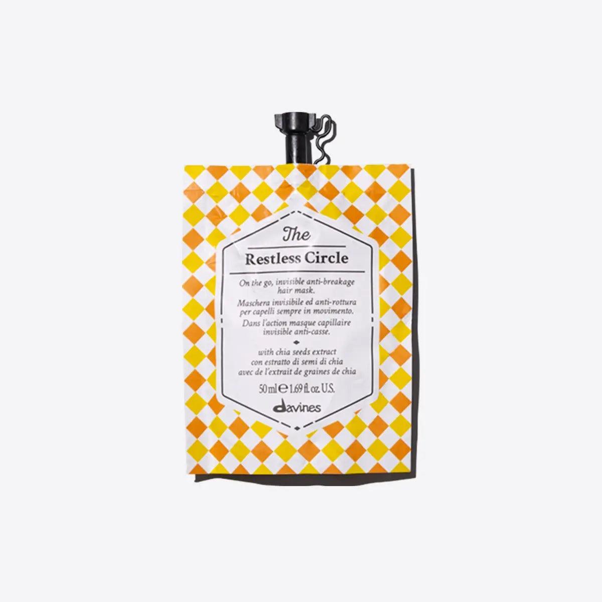 The Restless Circle anti-breakage hair mask pouch with yellow checkerboard design for on-the-go hair care.