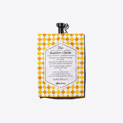 The Restless Circle anti-breakage hair mask pouch with yellow checkerboard design for on-the-go hair care.