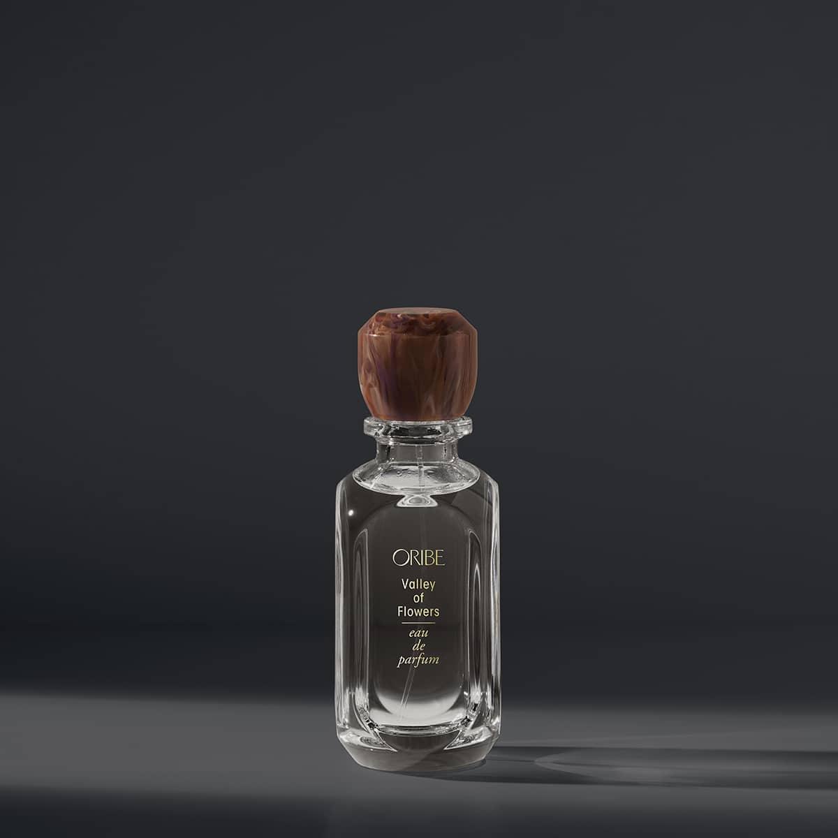 Luxury Oribe Valley of Flowers eau de parfum bottle against dark background