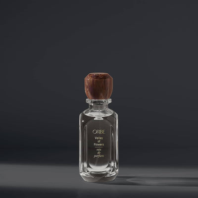Luxury Oribe Valley of Flowers eau de parfum bottle against dark background