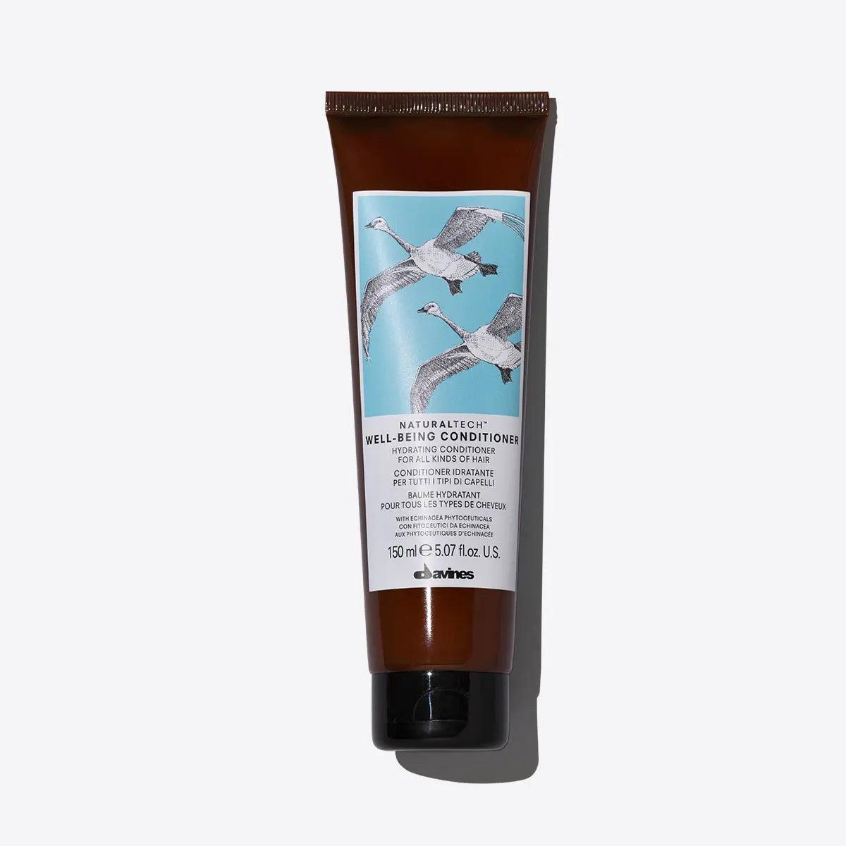 Wellbeing Conditioner tube with cranes design, moisturizing formula for all hair types, 150 mL size.