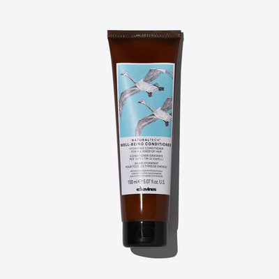 Wellbeing Conditioner tube with cranes design, moisturizing formula for all hair types, 150 mL size.
