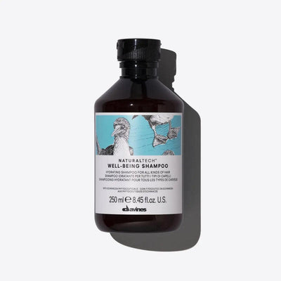 Naturaltech Wellbeing Shampoo bottle, 250 ml, moisturizing formula for all hair types with protective extracts.